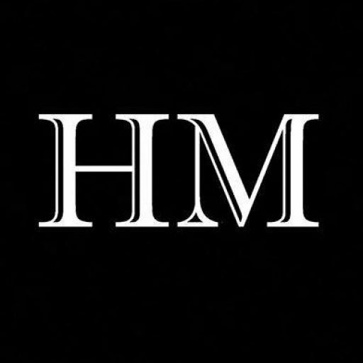 Letters H and M. HM Event Promotions Logo. White writing on black background.